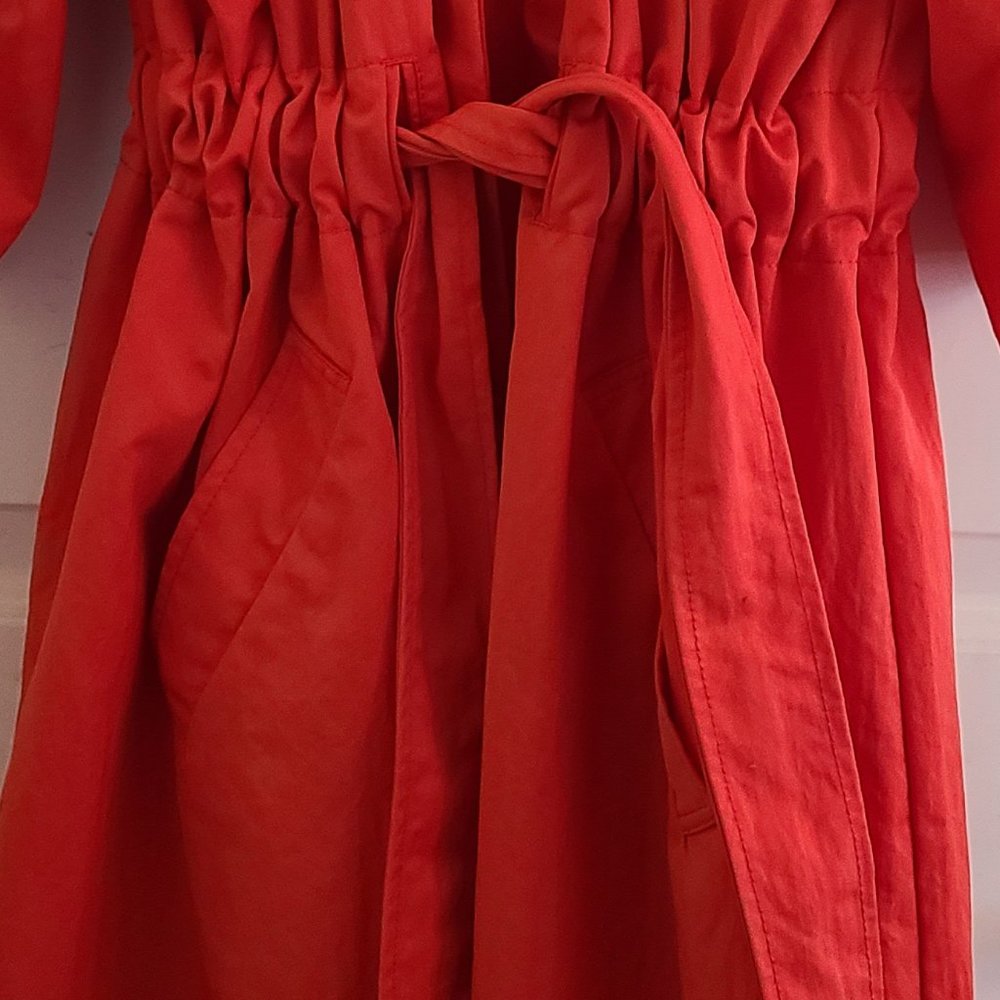 Orange belted coat